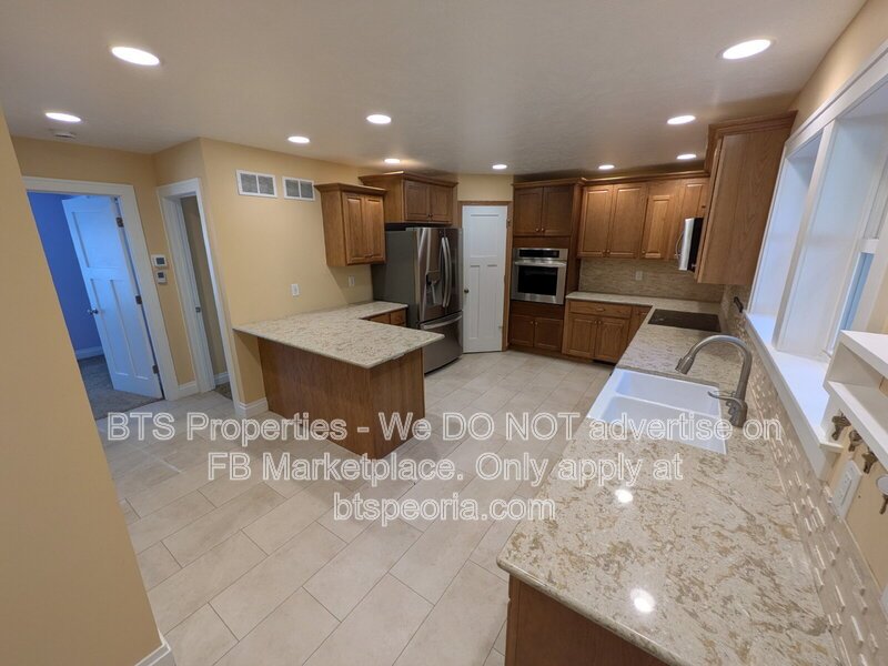 Spacious 4-Bedroom Retreat with 4 Full Baths - 3612 North Harvard Avenue, Peoria! property image